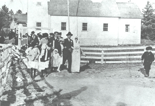 Old-Afognak-people-outside-of-church.jpg